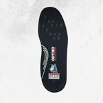 A single black orthopedic shoe insole with ventilation holes, featuring the brand logos for Ortho Comfort and Speed Blue on a light gray textured background.