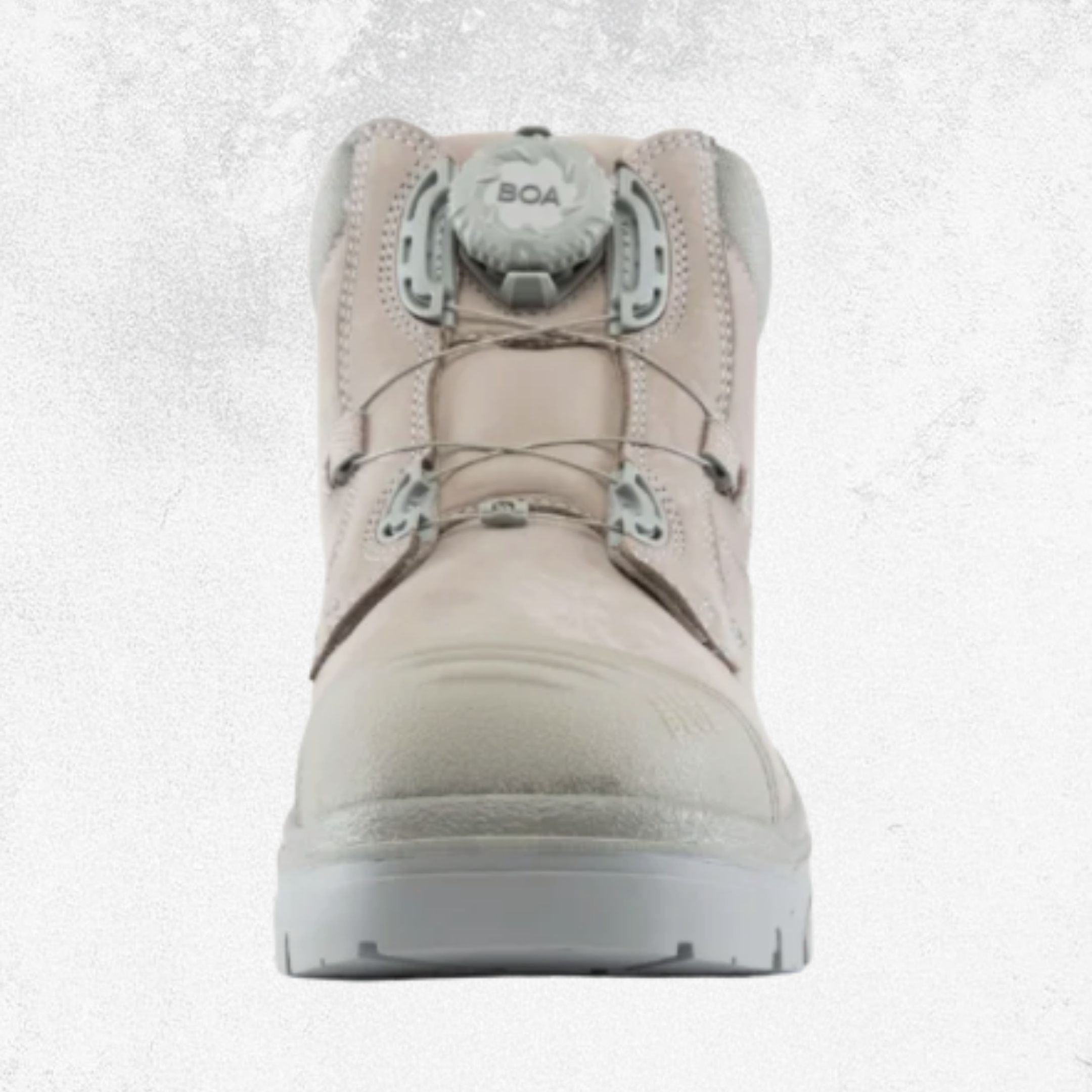 A single mid-calf work boot in a light beige/tan color with a gray BOA dial closure system and a white outsole, shown from a front-facing perspective against a light gray textured background.