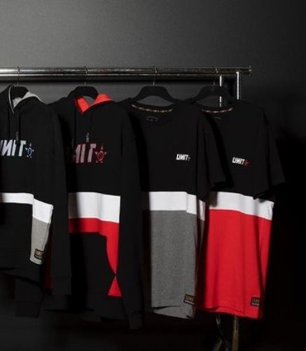 UNIT Men's Express Tees lined up on hangers