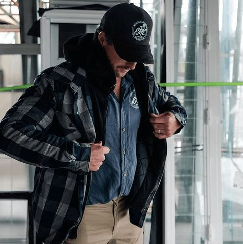A man wearing the JetPilot Quilted Men's Flannel Jacket 