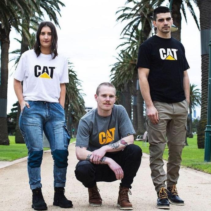 CAT Lifestyle image of three people wearing CAT clothing