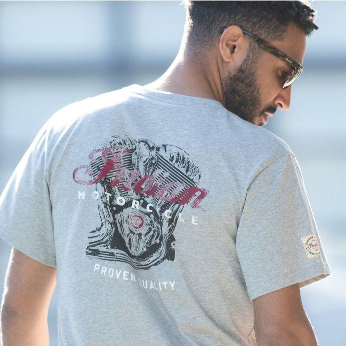 Indian Motorcycle GRAY ENGINE LOGO TEE | Man Cave Workwear A person wearing an Indian Engine Logo Tee casually