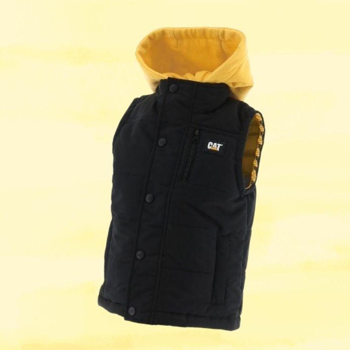 CAT Kids Puffer Vest | Man Cave Workwear CAT Kids Puffer Vest with a yellow textured background