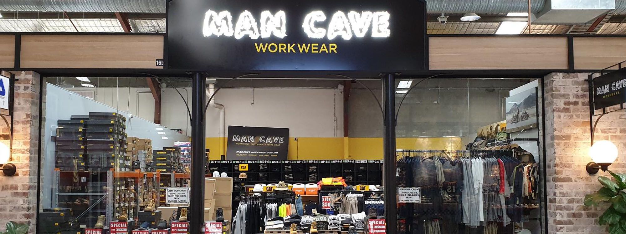 Store front for Man Cave Workwear in fashion spree shopping centre