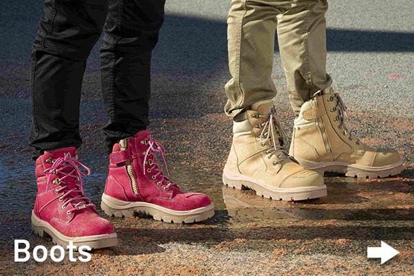 Two Women tradies wearing workwear boots onsite in Australia construction site.