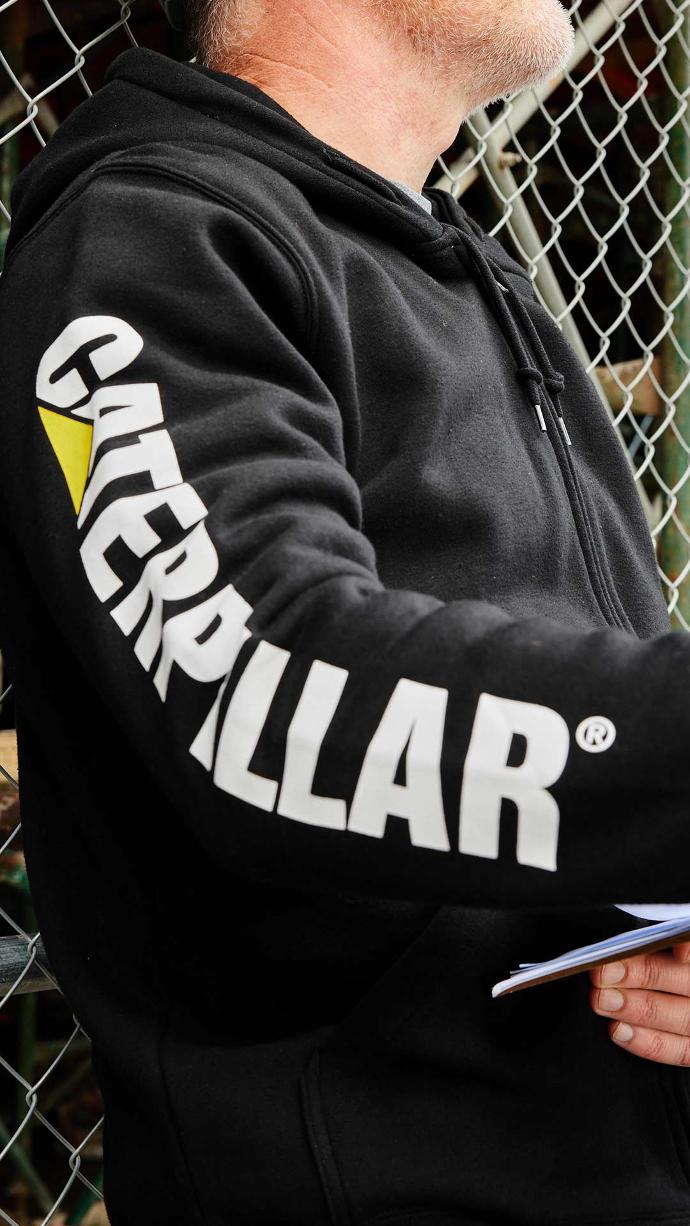 close up of CAT Workwear logo on CAT Midweight Banner Full Zip Hoodie
